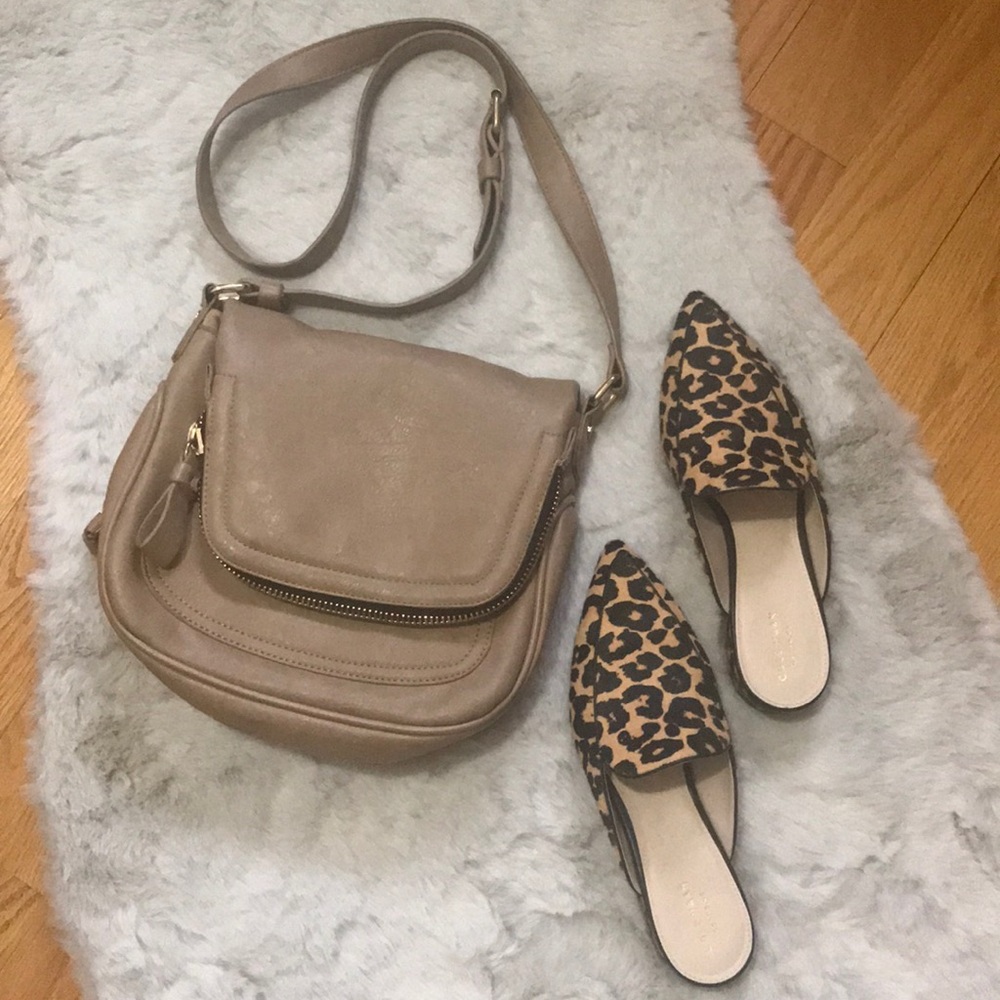 Tan satchel with gold zippers